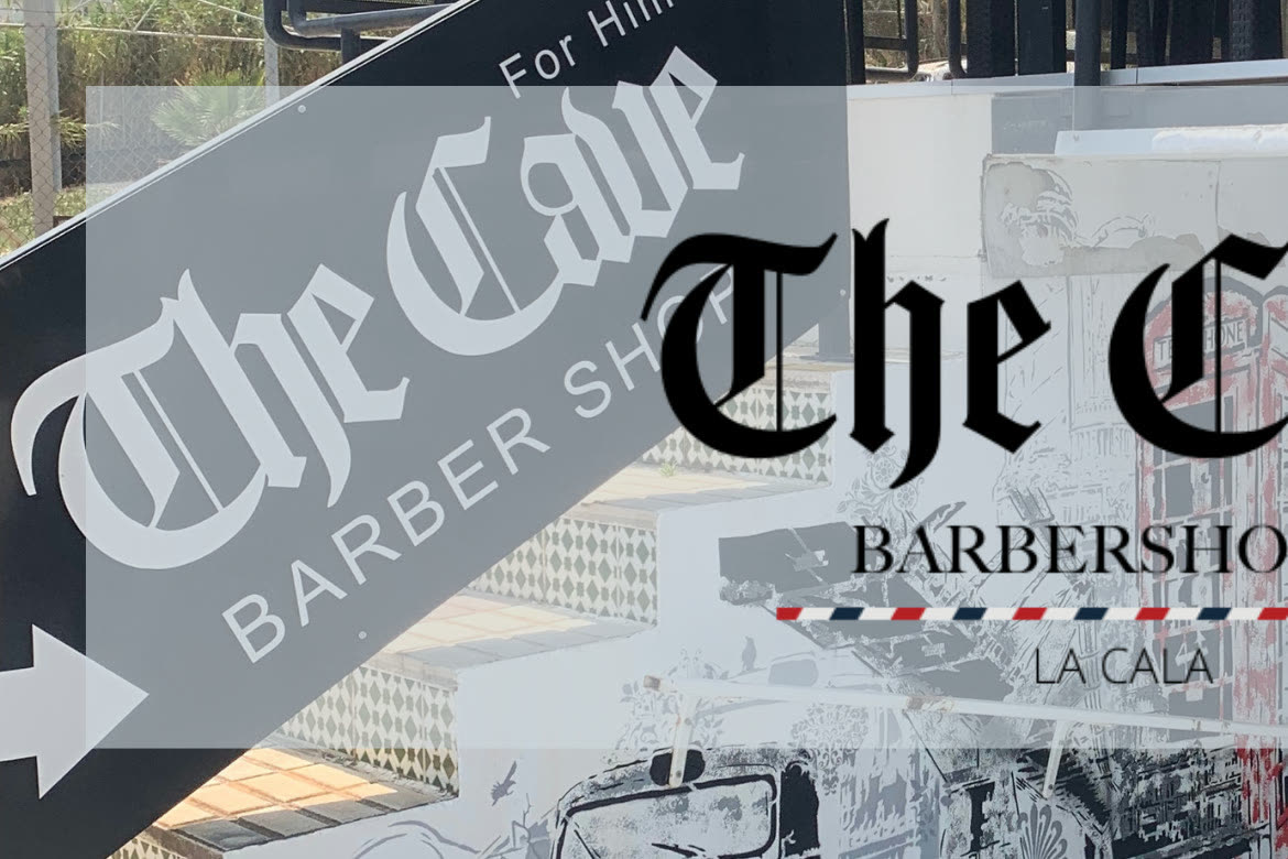 The Cave barbershop entrance sign on Avenida Las Gardenias, La Cala de Mijas
