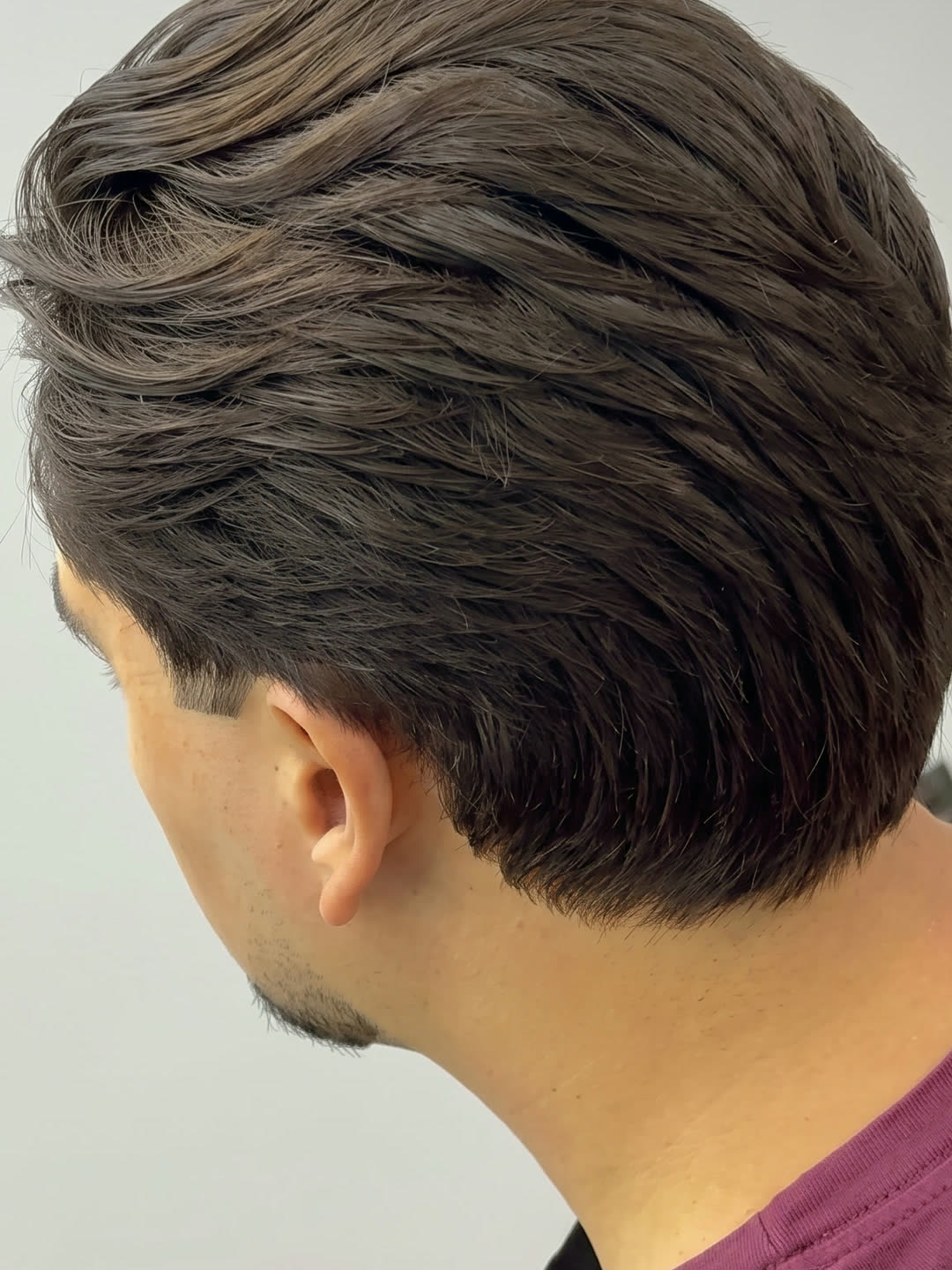 Neckline finished clean after a scissor cut at The Cave