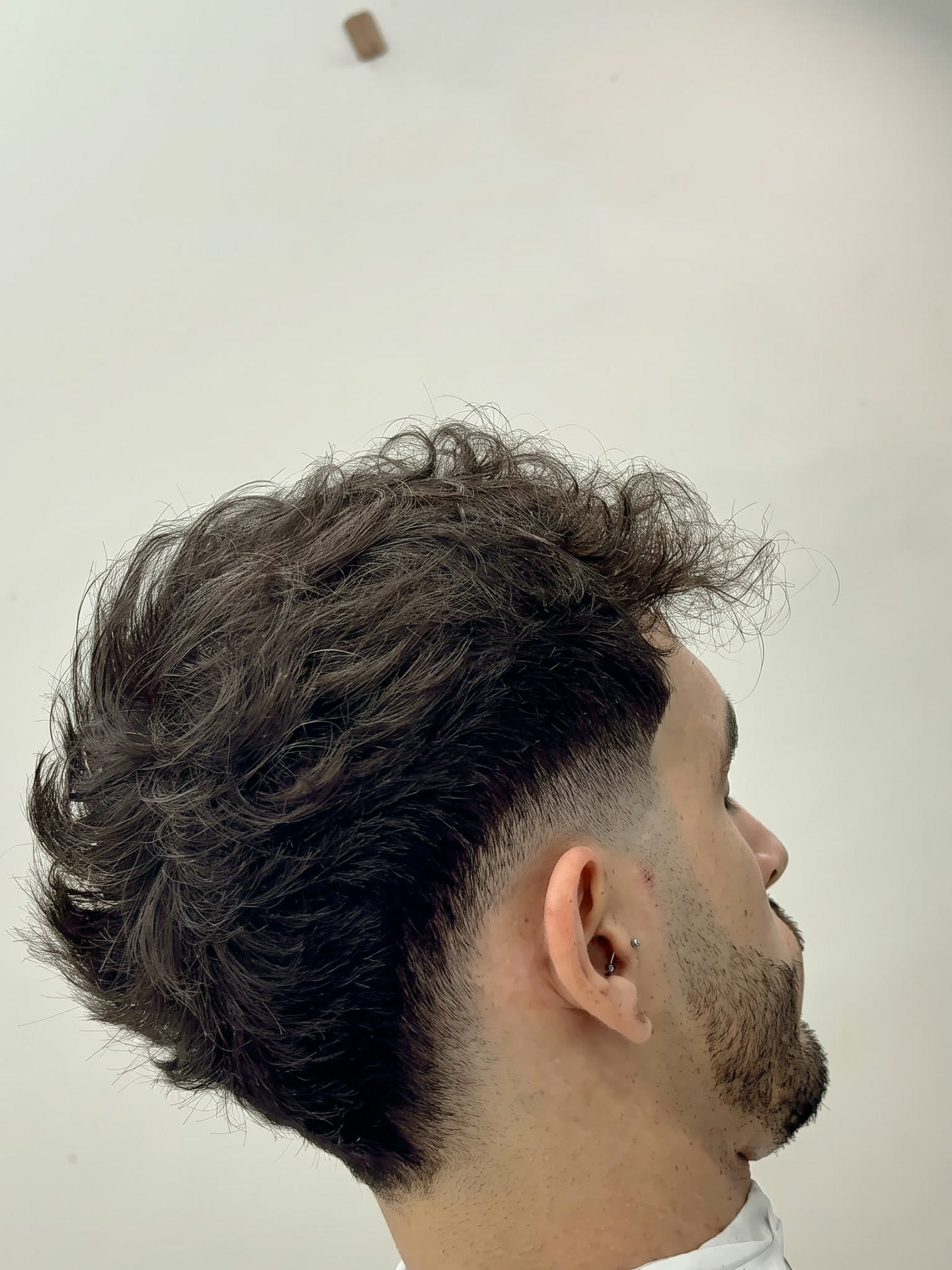 Textured crop over a faded beard